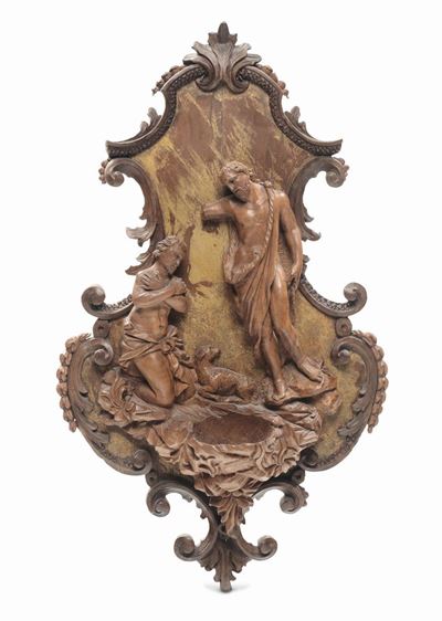 Acquasantiera in Legno Riccamente Intagliato e Scolpito con Motivi a Pellacce. Europa XVIII Secol...