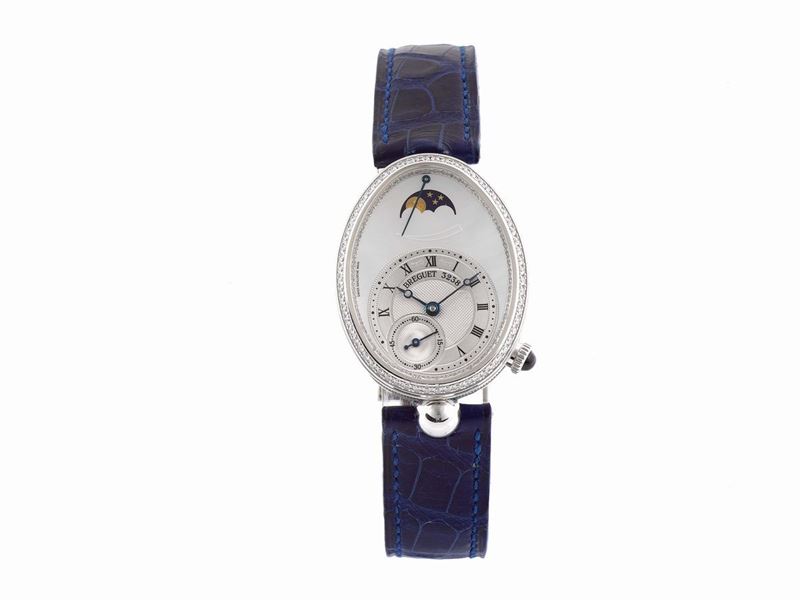 BREGUET, Reine de Naples, No. 3238, Ref. 8908, elegant, egg-shaped, 18K white gold and diamond-set, water-resistant, self-winding, lady’s wristwatch with phases of the moon, power reserve indication and an 18K white gold deployant clasp set with 26 round diamonds. Made circa 2008  - Auction Watches and Pocket Watches - Cambi Casa d'Aste