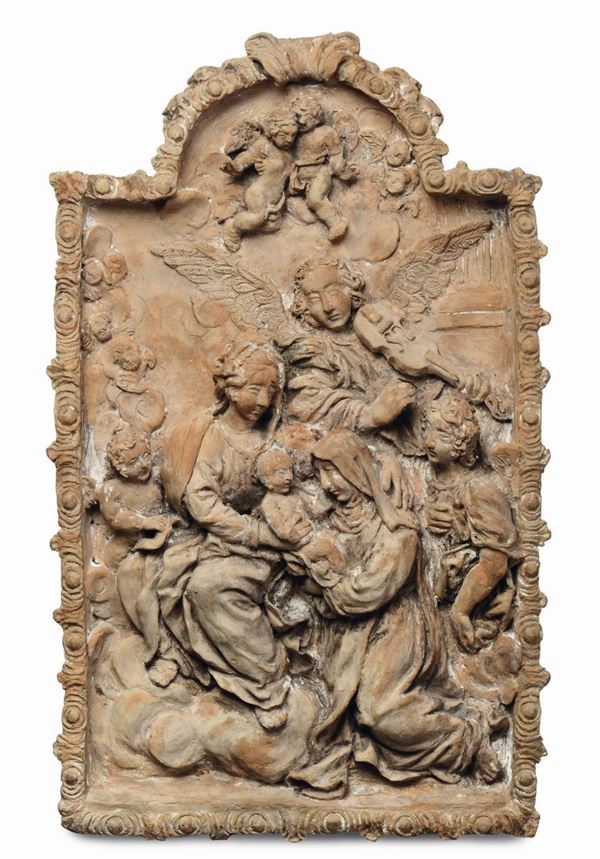 Placca in terracotta raffigurante Madonna con Bambino e Santi