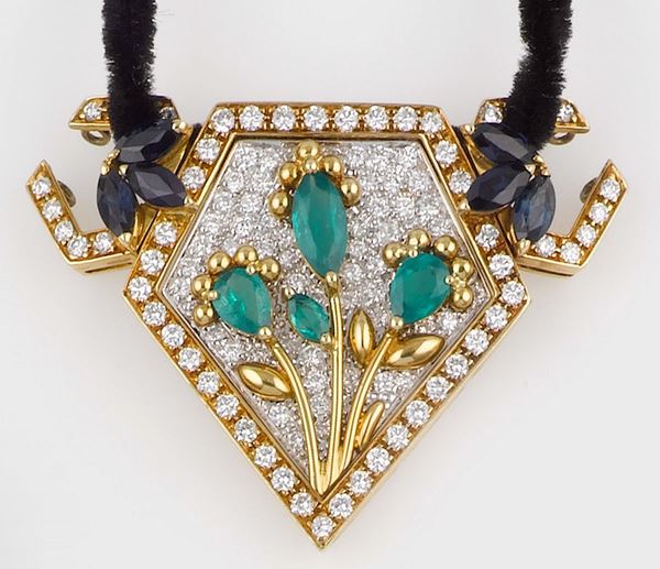 A diamond, emerald and sapphire pendant