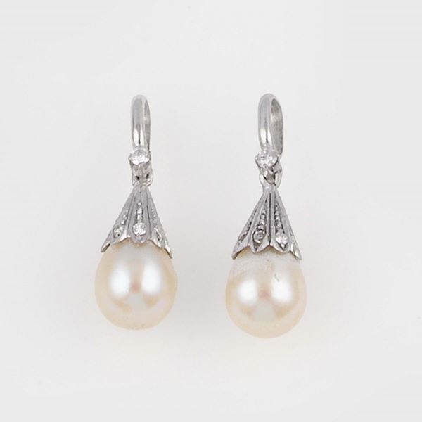 A pair of unmounted pearls