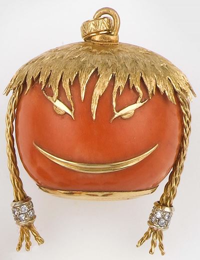 Pendente in Corallo Raffigurante un Viso