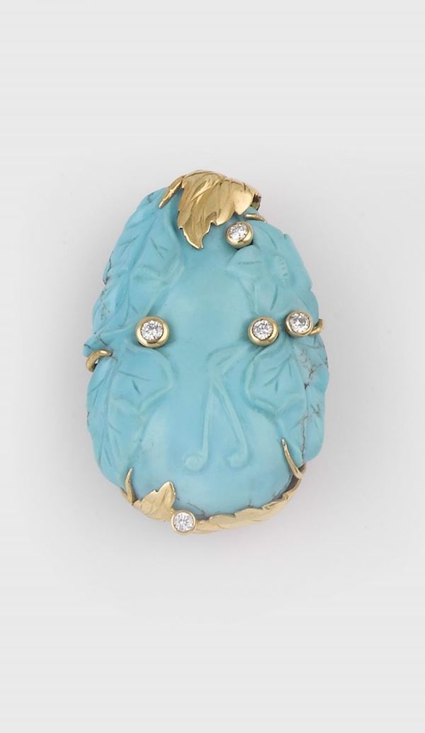 A diamond and carved turquoise brooch