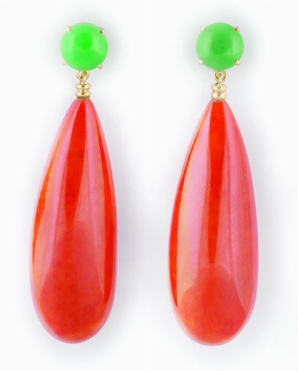 A pair of coral and jadeite pendent earrings