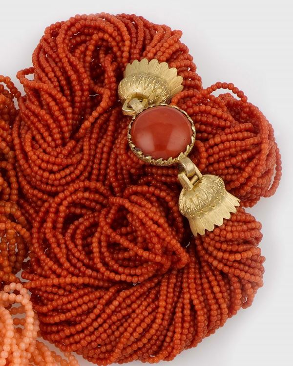 A multi-stand coral necklace