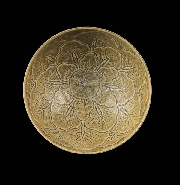 A Cizhou green glaze stoneware bowl with floral decoration, China, Song Dynasty, 10th century
