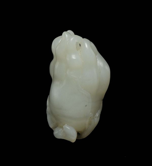 A carved white jade Buddha's hand, China, Qing Dynasty, 18th century