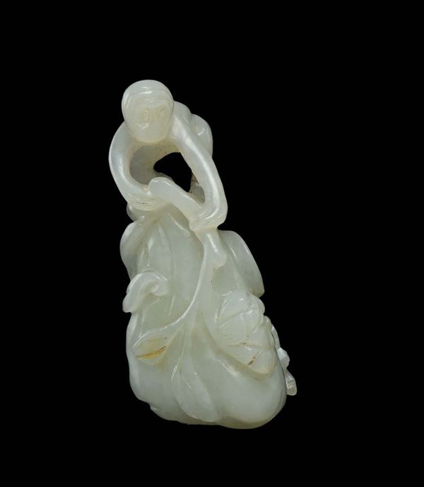 A white jade monkey on a rock group, China, Qing Dynasty, 19th century