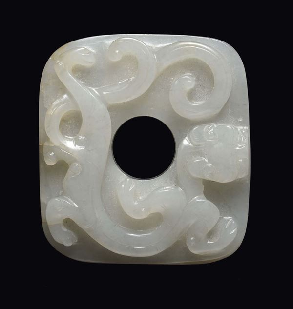 A white jade belthook with mythical animal in relief, China, Qing Dynasty, 18th century