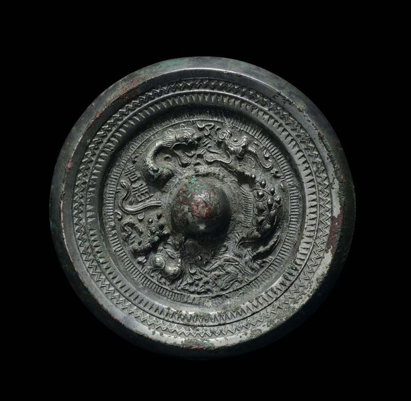 A bronze Bo Ju mirror with central boss, China, Han Dynasty (206 b.C-220 a.C.)  - Auction Fine Chinese Works of Art - Cambi Casa d'Aste