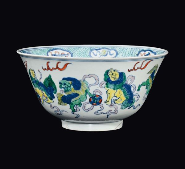 A Ducai porcelain bowl with Pho dogs, China, Qing Dynasty, Daoguang Mark and of the Period (1821-1850)