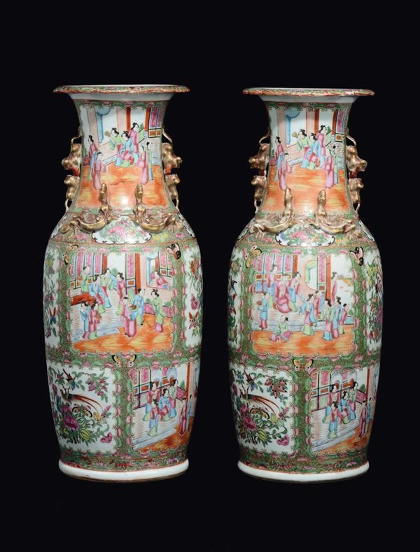 A pair of Famille-Rose vases with court life scenes within reserves, China, Qing Dynasty, 19th century