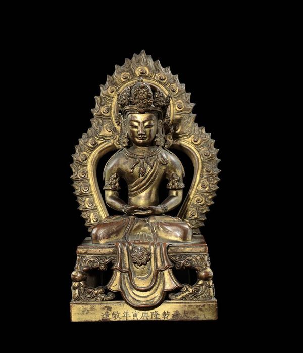 A gilt bronze figures of Amitayus with aura, China, Qing Dynasty, Qianlong Mark and of the Period (1736-1795)