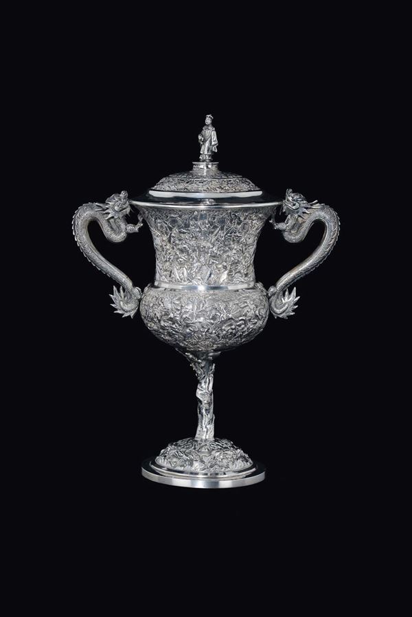 A silver vase and cover with dragon handles, China, Qing Dynasty, 19th century