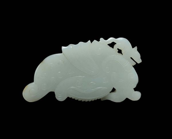 A white jade dragon and cat group, China, Qing Dynasty, 18th century