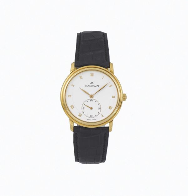 BLANCPAIN, No. 37, thin, 18K yellow gold wristwatch with an 18K yellow gold Blancpain buckle. Accompanied by the original  box and Guarantee. Made circa 1990