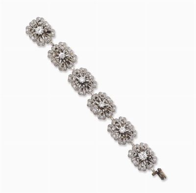 Bracciale con Diamanti Smontabile in un Paio di Orecchini e Due Paia di Clips