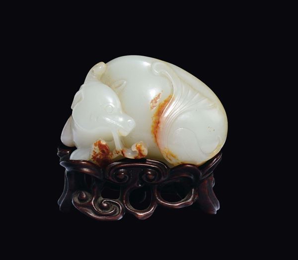 A Celadon white and russet jade mythical beast and mushroom, China, Qing Dynasty, 18th century