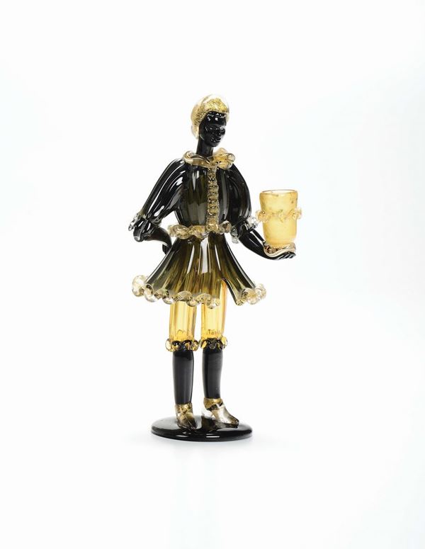 A Murano glass Venini candlestick in the shape of  African boy