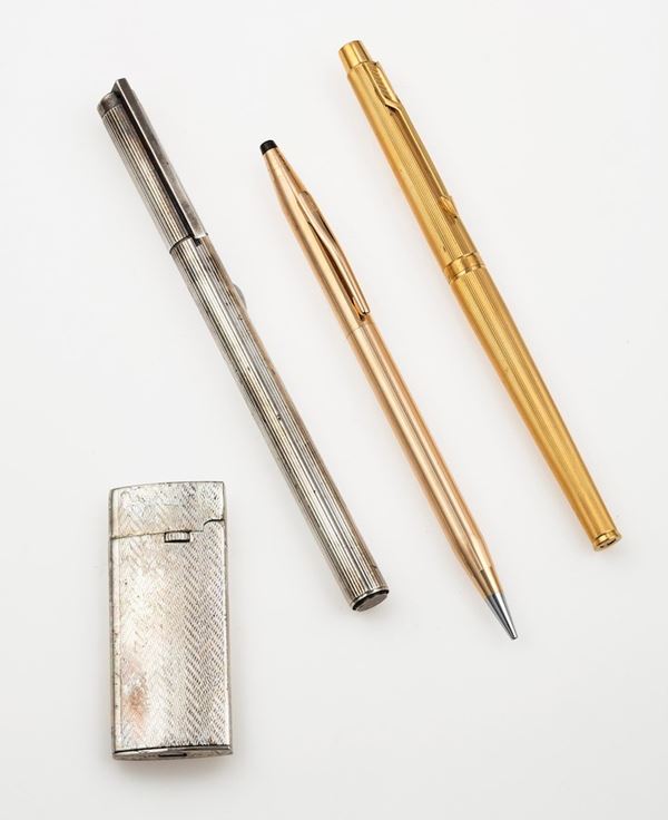 Lotto composto da due stilografiche , un portamine ed un accendino, danni, penne inutilizzabili per deterioramento, materiali vari