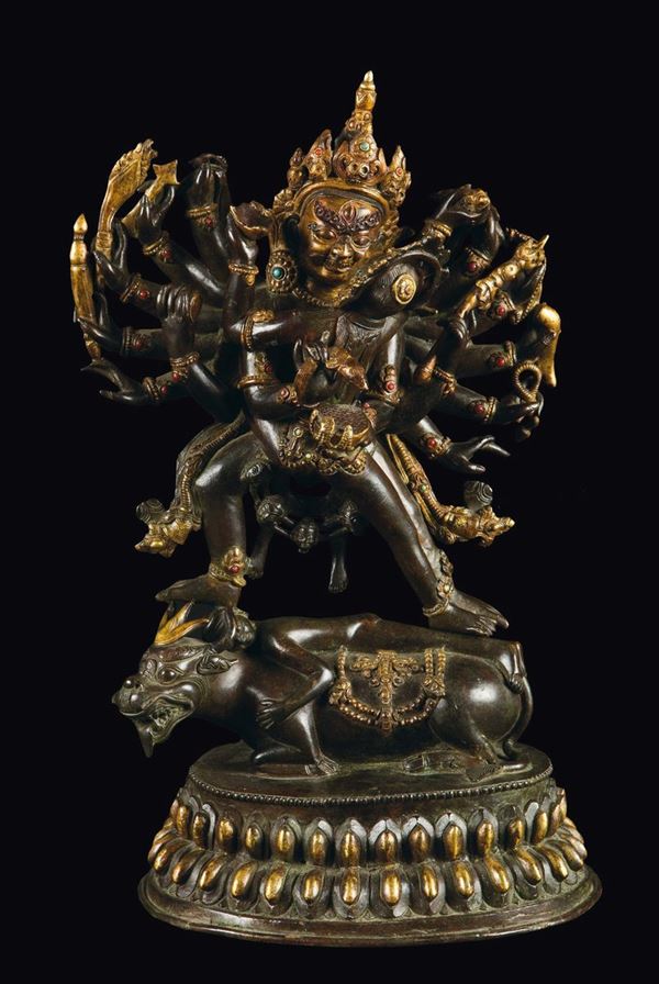 A semi-gilt bronze figure of Outer Yama with semi-precious stones inlays, China, Qing Dynasty, 19th century