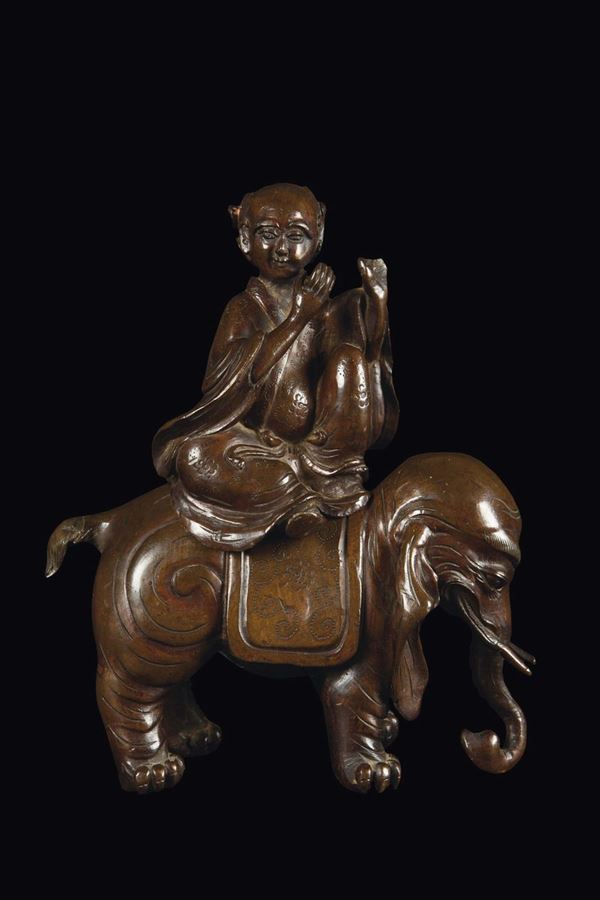 Incensiere in bronzo a guisa di elefante sormontato da suonatore, Cina, Dinastia Ming, XVII secolo