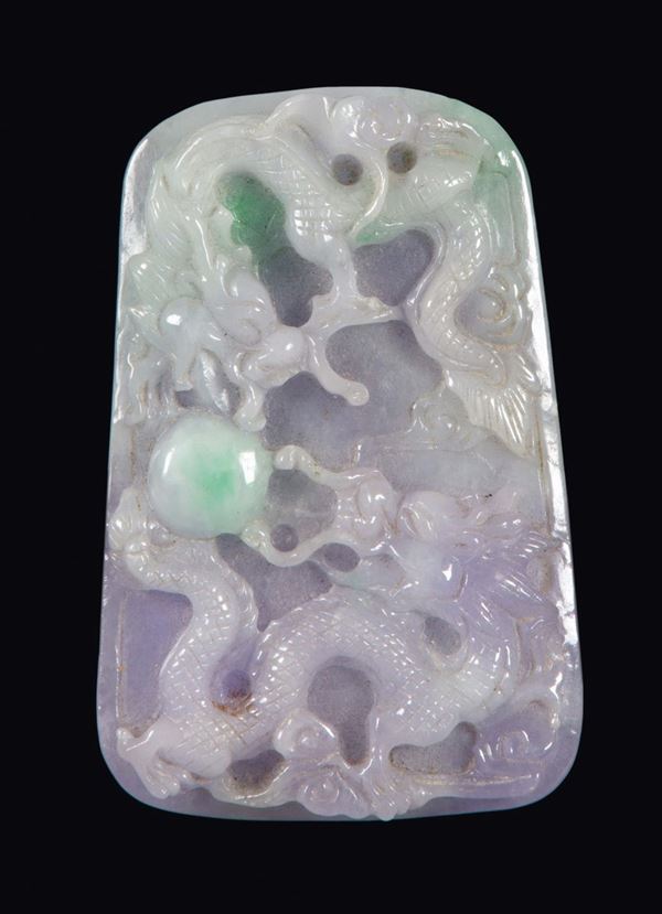 A lavender and green apple jadeite with dragons in relief, China, 20th century