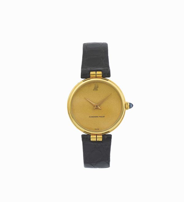 AUDEMARS PIGUET, 18K yellow gold lady's wristwatch with an 18K buckle. Made circa 1970