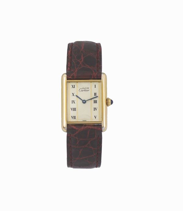 Must de Cartier, Paris, Tank, case No 580005, rectangular, gold-plated sterling silver quartz wristwatch with original buckle. Made circa 1980