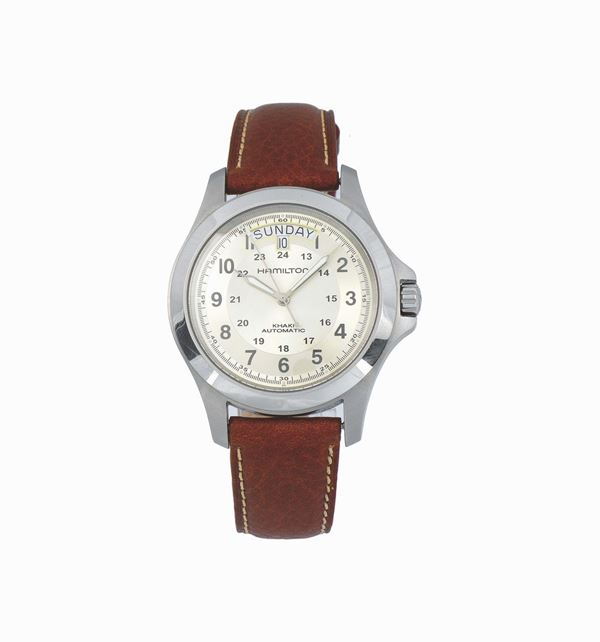 HAMILTON, Khaki, Automatic, Day-Date,  unusual, self-winding, water-resistant, stainless steel wristwatch with stwo time zone, day-date and a stainless steel Hamilton buckle. Accompanied by the original box, and Guarantee. Sold in 2007
