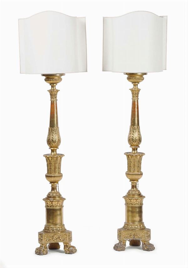 Coppia di portaceri in legno intagliato e dorato, XVIII secolo