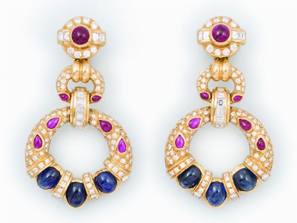 A pair of diamond, sapphire and ruby pendent earrings