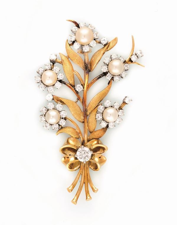 A cultured pearl and diamond brooch. Bulgari