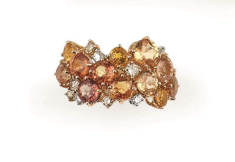An orange sapphire and diamond ring. Brarda  - Auction Jewels - II - Cambi Casa d'Aste