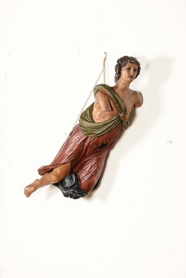 Polena in legno intagliato e dipinto in policromia raffigurante personaggio maschile