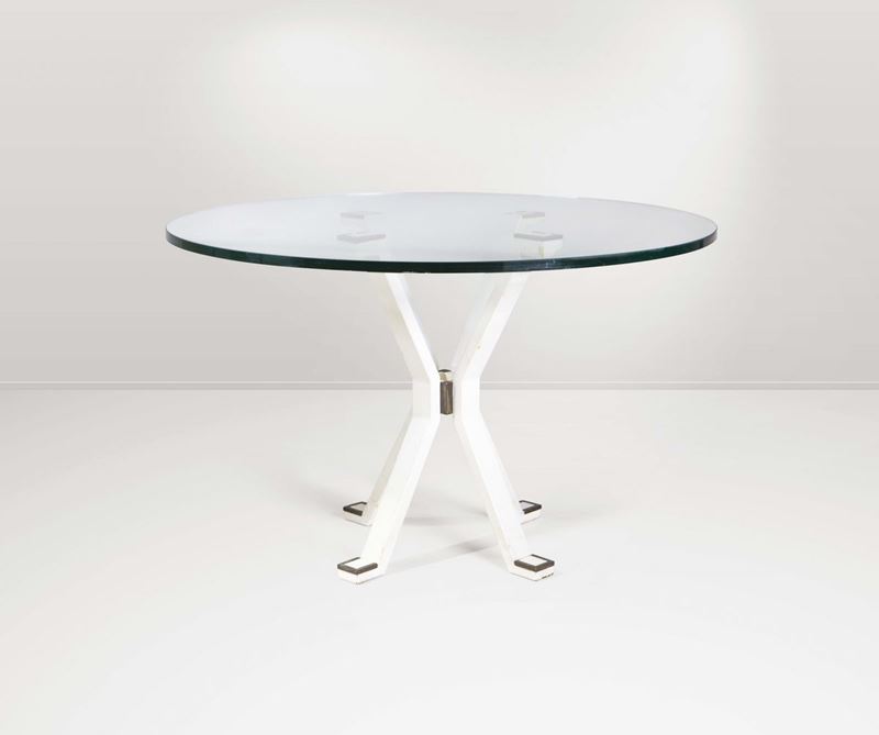 Tavolo con struttura in metallo, piano in cristallo molato di forte spessore e dettagli in ottone.  - Auction Design - Cambi Casa d'Aste