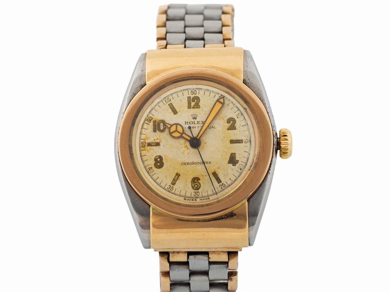 ROLEX, Oyster Perpetual Chronometer, case 45688, Ref. 3065. Very fine and rare, tonneau-shaped, center seconds, self-winding, water-resistant, 18K pink gold and steel wristwatch with hooded lugs and a stainless steel and pink gold Rolex bracelet with deployant clasp. Made circa 1940  - Auction Watches and Pocket Watches - Cambi Casa d'Aste