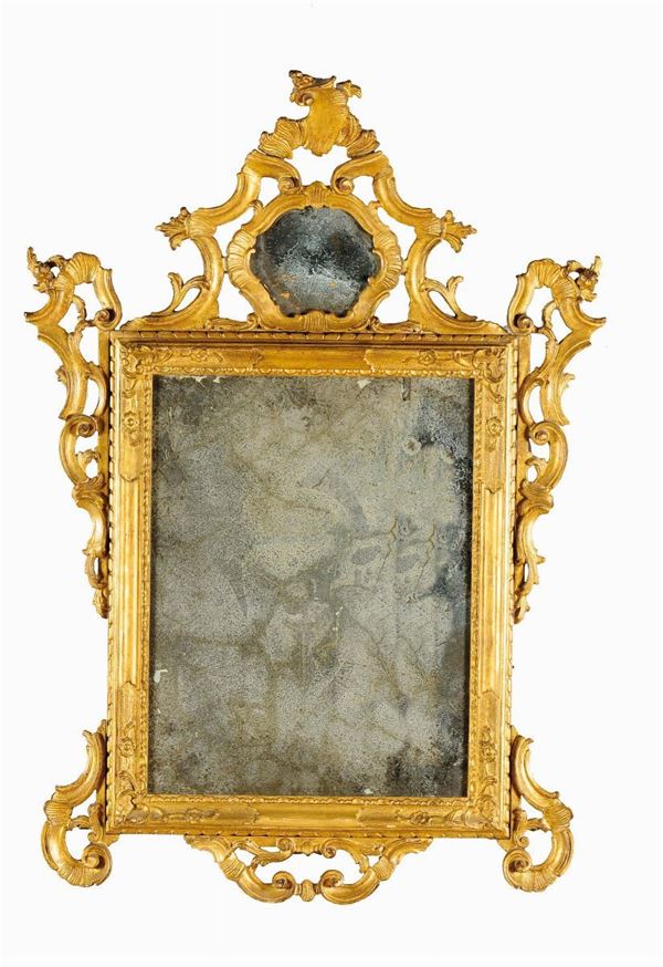 Specchiera Luigi XV in legno intagliato e dorato, metà XVIII secolo