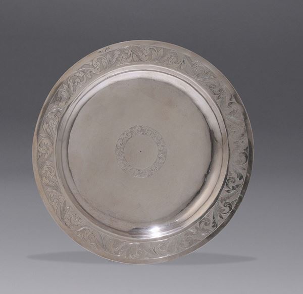 A round silver dish, Naples, 19th century.
