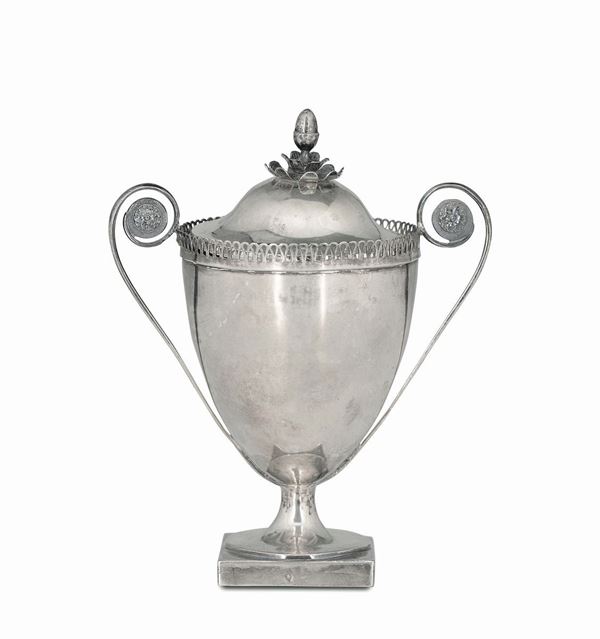 A sugar bowl in embossed and chiselled silver, Rome, beginning of the 19th century, cameral stamp (papal tiara and keys).