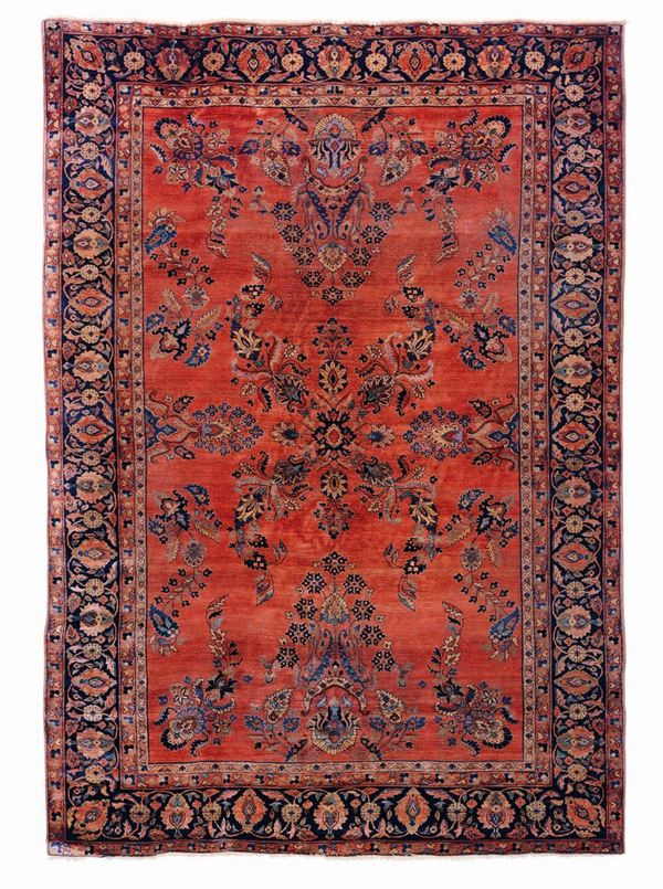 A Sarouk rug, Persia, early 20th century. Some areas are slightly worn.