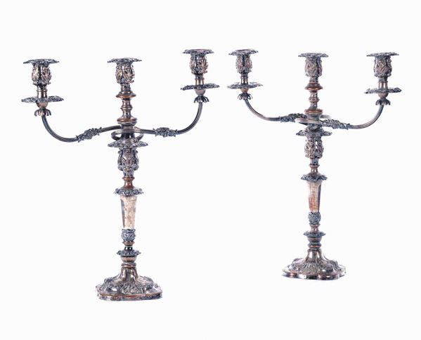 Coppia di candelieri in rame argentato a tre luci, XX secolo