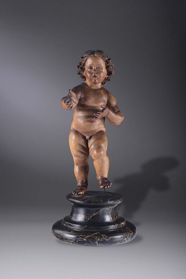 A wooden polychrome sculpture with baby Jesus. 18th-19th century Neapolitan sculptor.