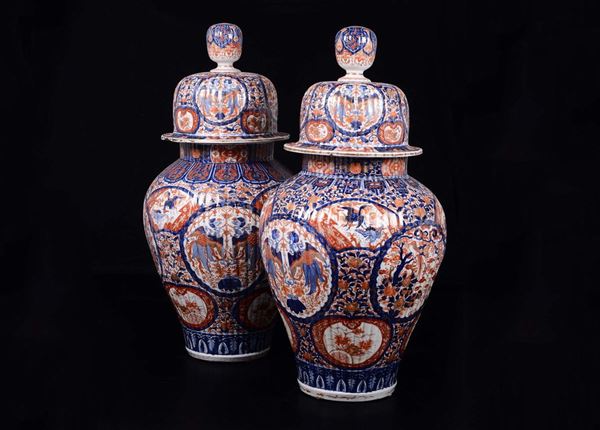 A pair of large Imari porcelain potiches and cover, Japan, 19th century