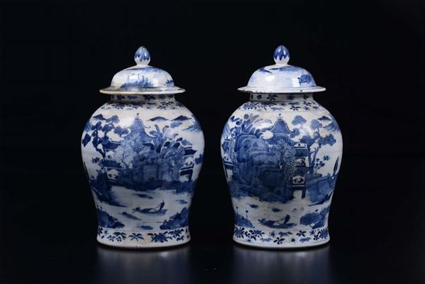 A pair of blue and white potiches and cover with landscapes, China, Qing Dynasty, 19th century