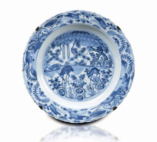 A blue and white dish with fawns and flowers, China, Ming Dynasty, Wanli Period (1573-1619)