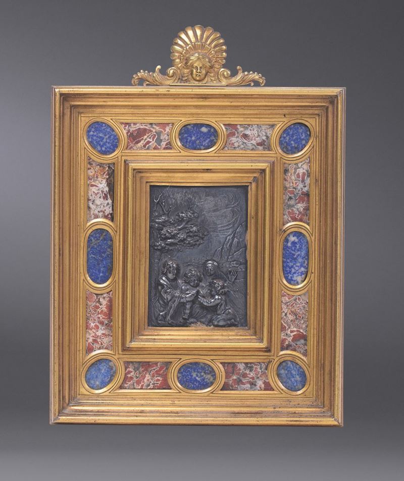 A silver plaque with the Virgin and Child, St. Giovannino and St. Anne. Bronze-gilt frame with lapis lazuli insertions. Rome or Florence, 17th-18th century.  - Auction Sculpture and Works of Art - Cambi Casa d'Aste