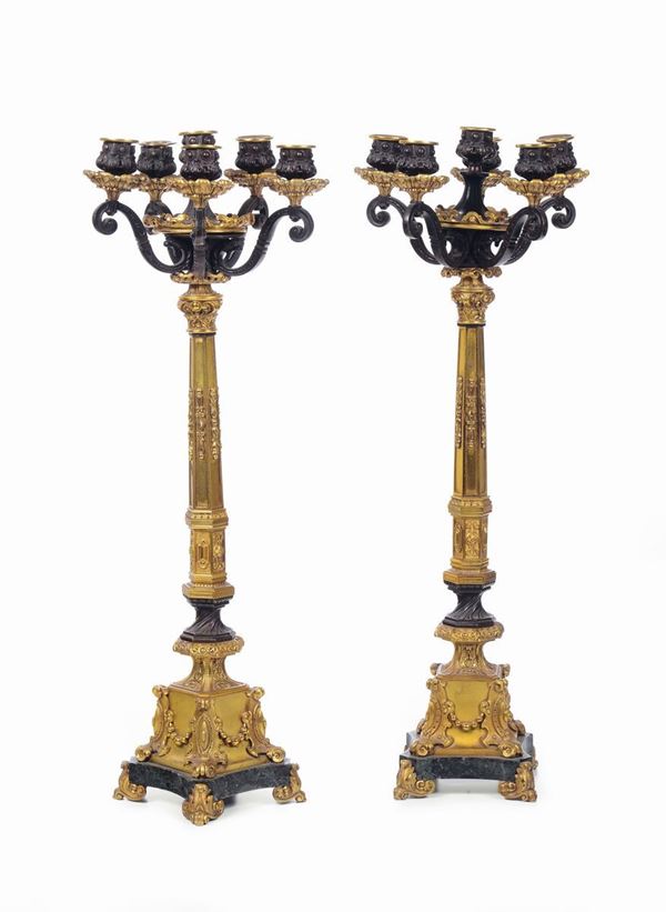 Coppia di candelabri a sei luci in bronzo e bronzo dorato, XIX secolo