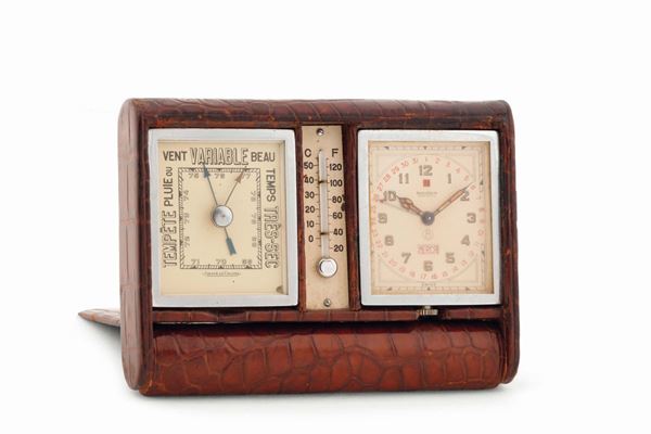 JAEGER-LeCOULTRE, Crocodile Desk  Barometre, Patent No. 365.884, fine and rare, steel desk compendium with 8-day clock, alarm, thermometer and barometer. Made circa 1940