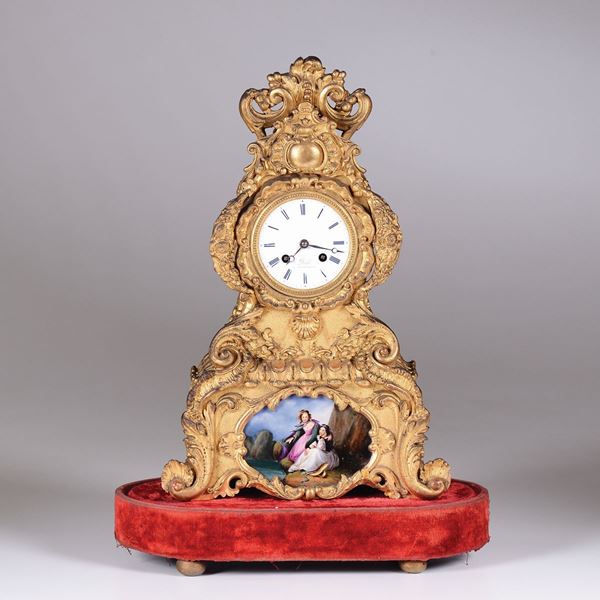 A gilt-stucco Charles X clock, Dihl a Montpellier, France, 19th century